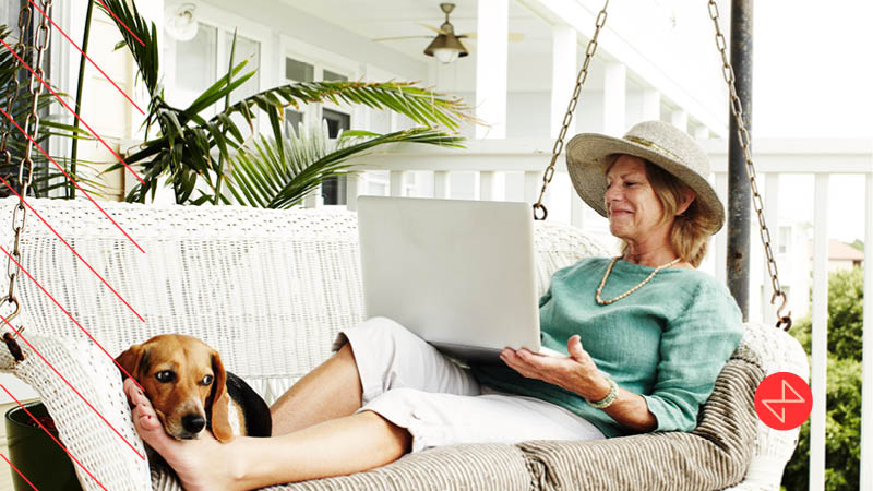 senior woman on laptop reading content and being targeted by marketing campaigns positioned to reach precise audiences