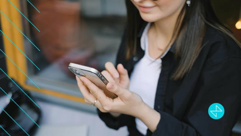 young woman on phone opting into third party cookies online